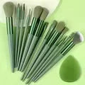 Professional 13-piece makeup brush set by amzzonstore with fluffy brushes for foundation, eyeshadow, blush, and powder application.