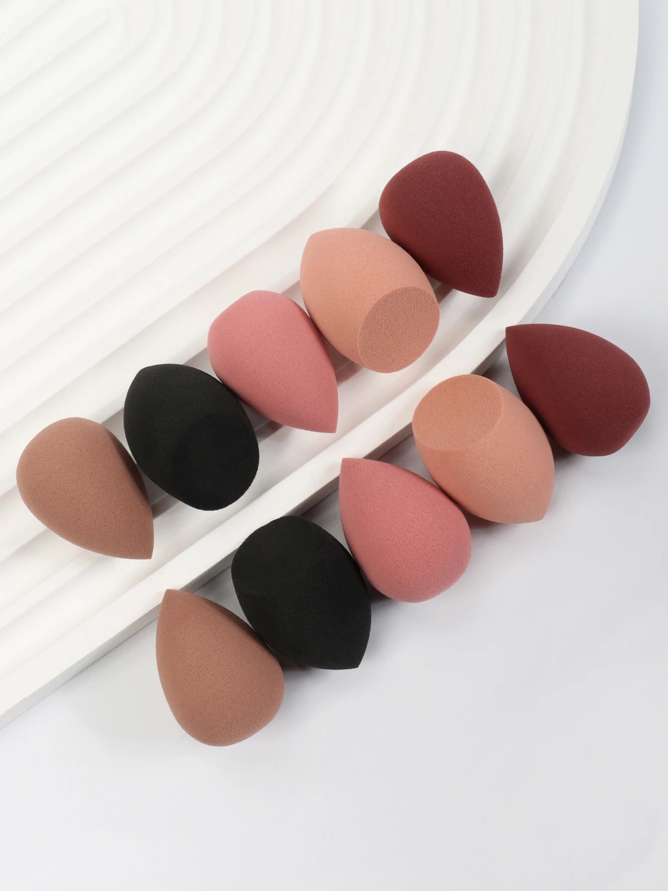 Set of 10 mini makeup sponge puffs for foundation, concealer, and face powder from amzzonstore, soft and versatile cosmetic applicators