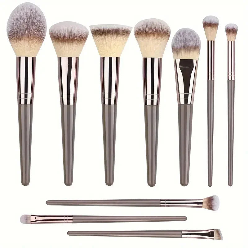 Set of professional makeup brushes including foundation, eyeshadow, concealer, blush, and kabuki brushes from amzzonstore.