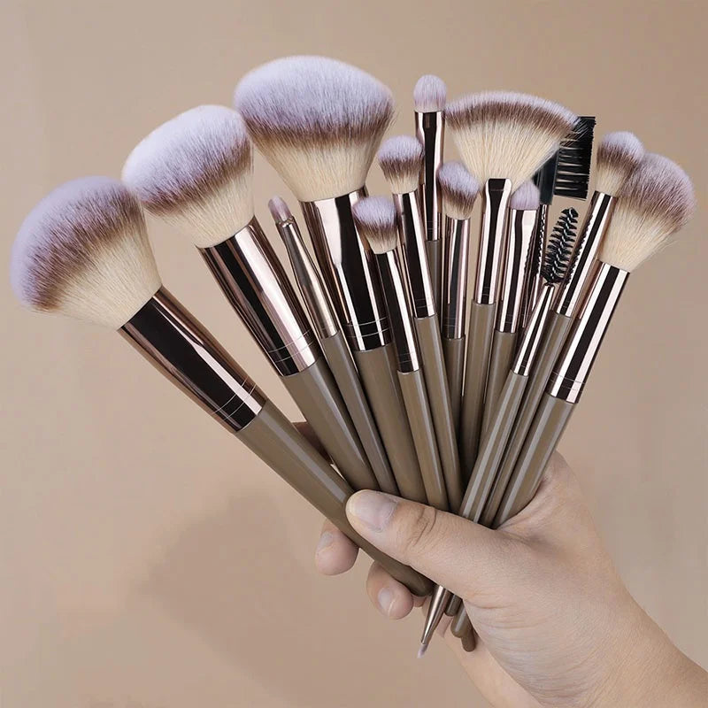 Set of professional makeup brushes including foundation, eyeshadow, concealer, blush, and kabuki brushes from amzzonstore.