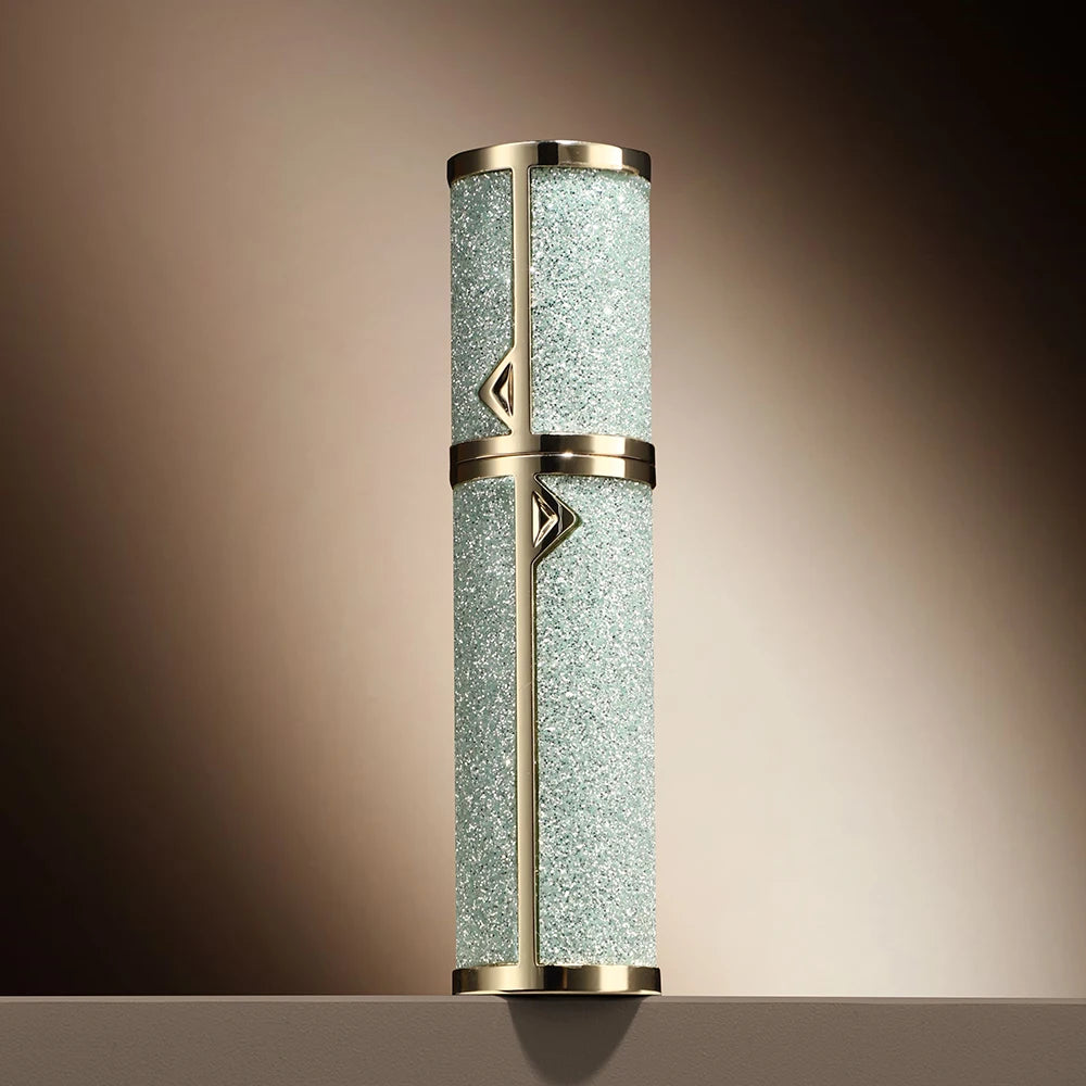 Refillable 5ML leather perfume atomizer from amzzonstore, compact travel spray bottle with a sleek black leather finish.
