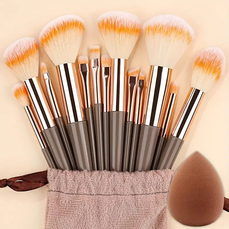 Set of 13 professional makeup brushes from amzzonstore including foundation, eyeshadow, blush, and blending brushes with soft, fluffy bristles.