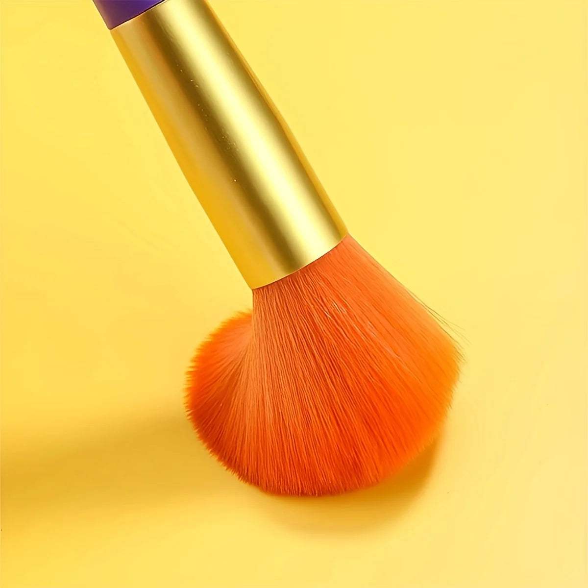 Colorful 15-piece makeup brush set by amzzonstore with foundation, blush, concealer, eye shadow, and blending brushes.