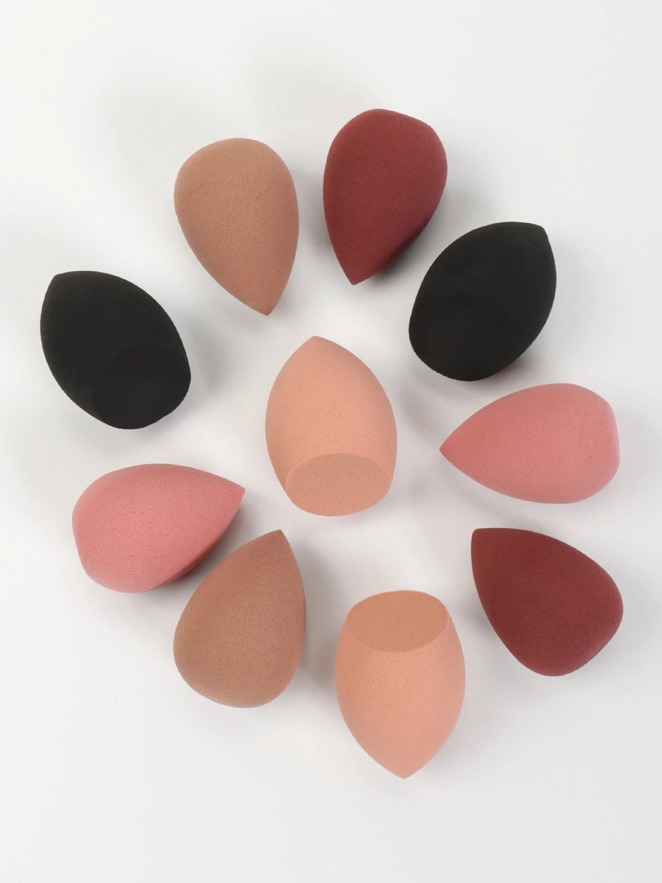 Set of 10 mini makeup sponges by amzzonstore, ideal for applying foundation, concealer, and powder for a flawless finish.