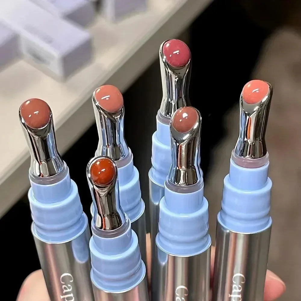 Metal head ice diamond essence lip tint from amzzonstore with water light glass finish, moisturizing and plumping lip gloss.