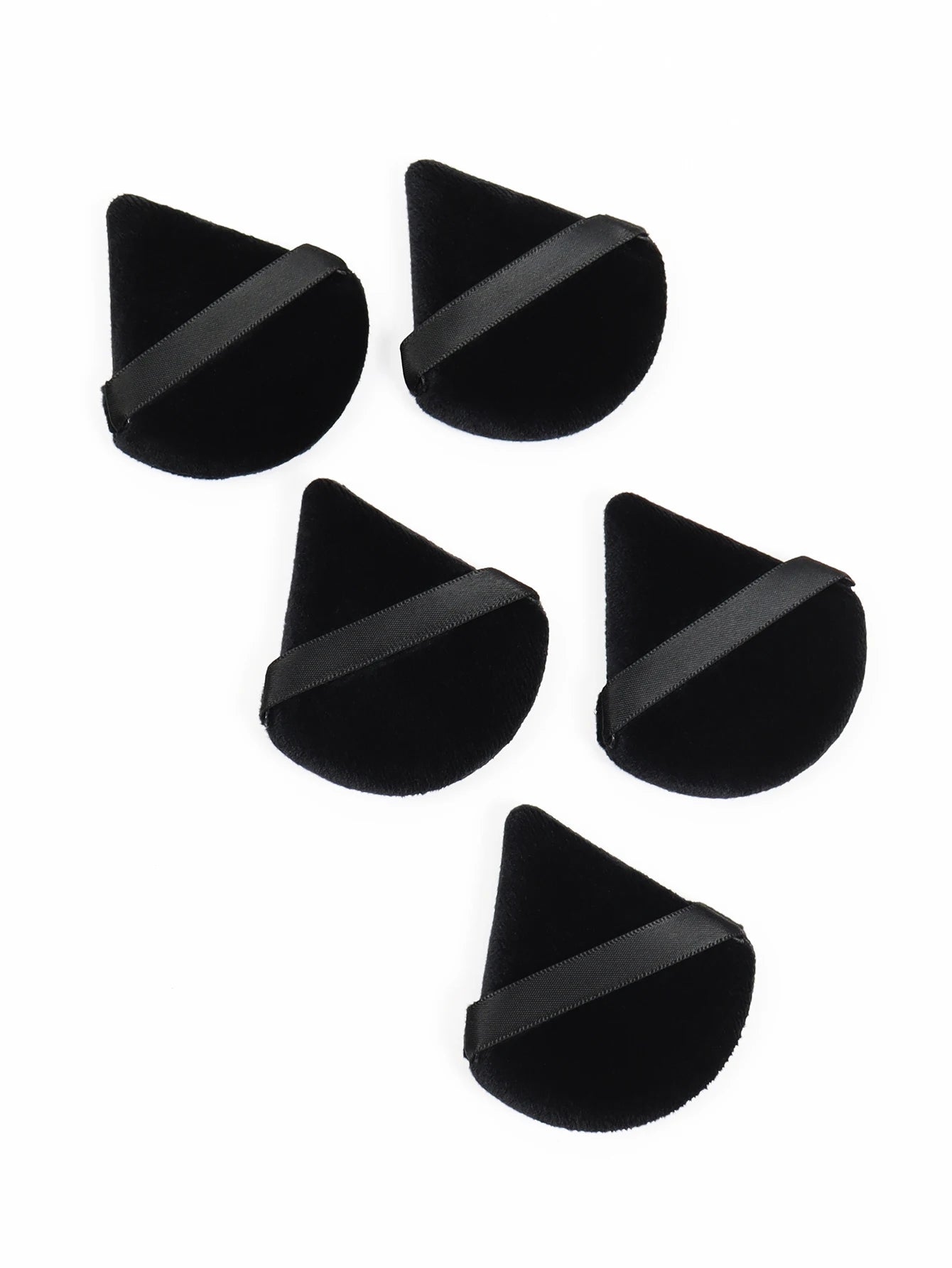 Black triangle-shaped makeup sponge by amzzonstore, soft velvet cosmetic puff for foundation and facial makeup application.