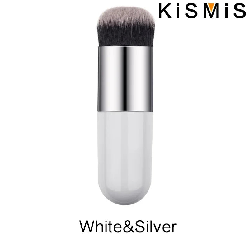 Set of professional flat cream makeup brushes including foundation, blush, and contour brushes, ideal for flawless face application.