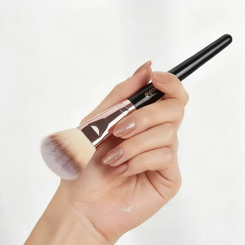 Set of professional makeup brushes including foundation, eyeshadow, concealer, blush, and kabuki brushes in a soft, fluffy design.