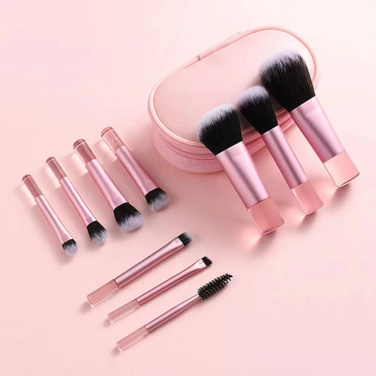 Mini makeup brush set with 10 brushes in a portable pouch, ideal for face and eye makeup application, by amzzon.store.