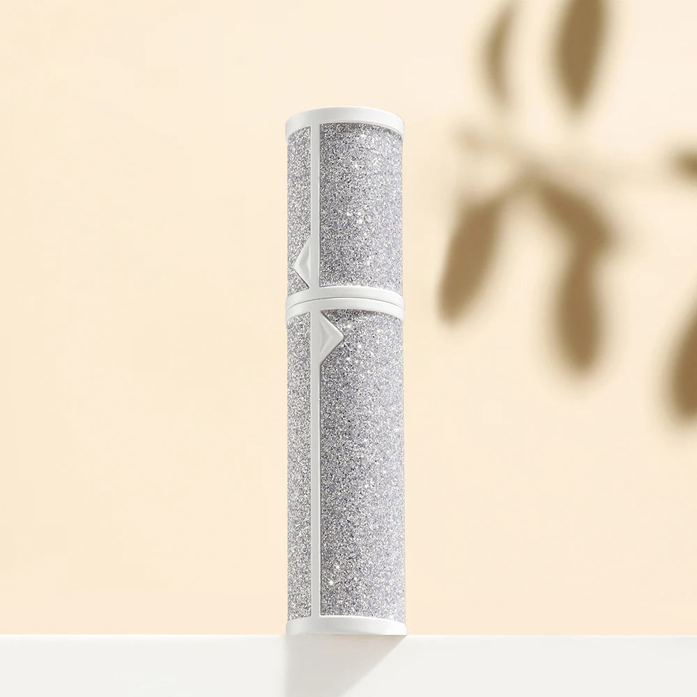 Small black leather perfume atomizer spray bottle with 5ML capacity, portable and refillable for travel use.