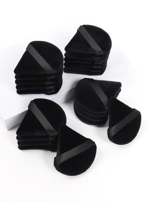 Black triangle powder puff by amzzonstore, soft velvet makeup sponge for foundation and beauty application, versatile cosmetic tool.