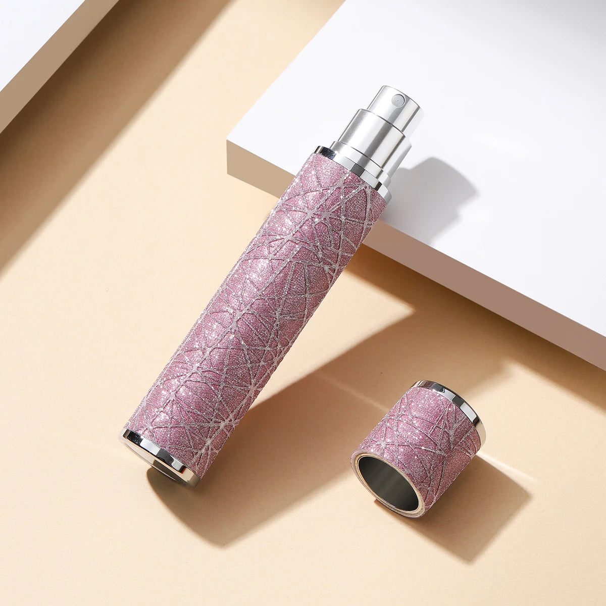 Refillable 5ML leather travel perfume spray bottle from amzzonstore, compact and portable for convenient on-the-go fragrance application.