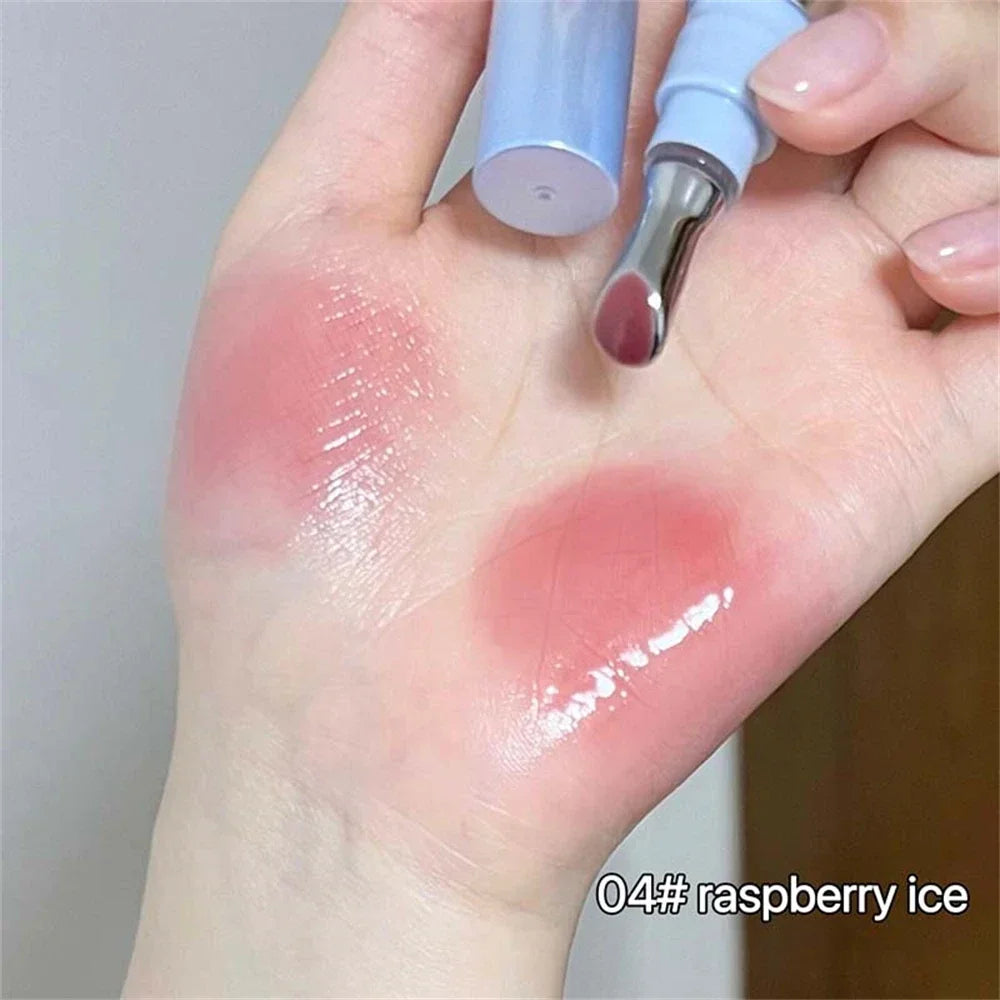 Amzzonstore Metal Head Ice Diamond Essence Lip Tint with mirror, glass applicator, moisturizing and plumping lip gloss for smooth lips.