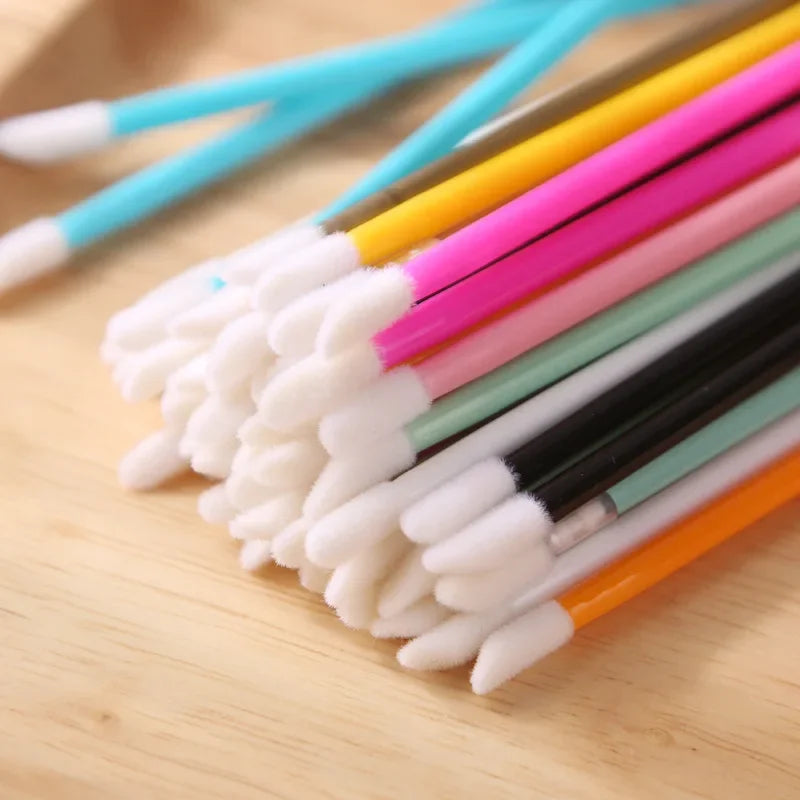 Set of 500 disposable lip wand applicators for lipstick and gloss, professional makeup tools by amzzonstore, in a wholesale kit.