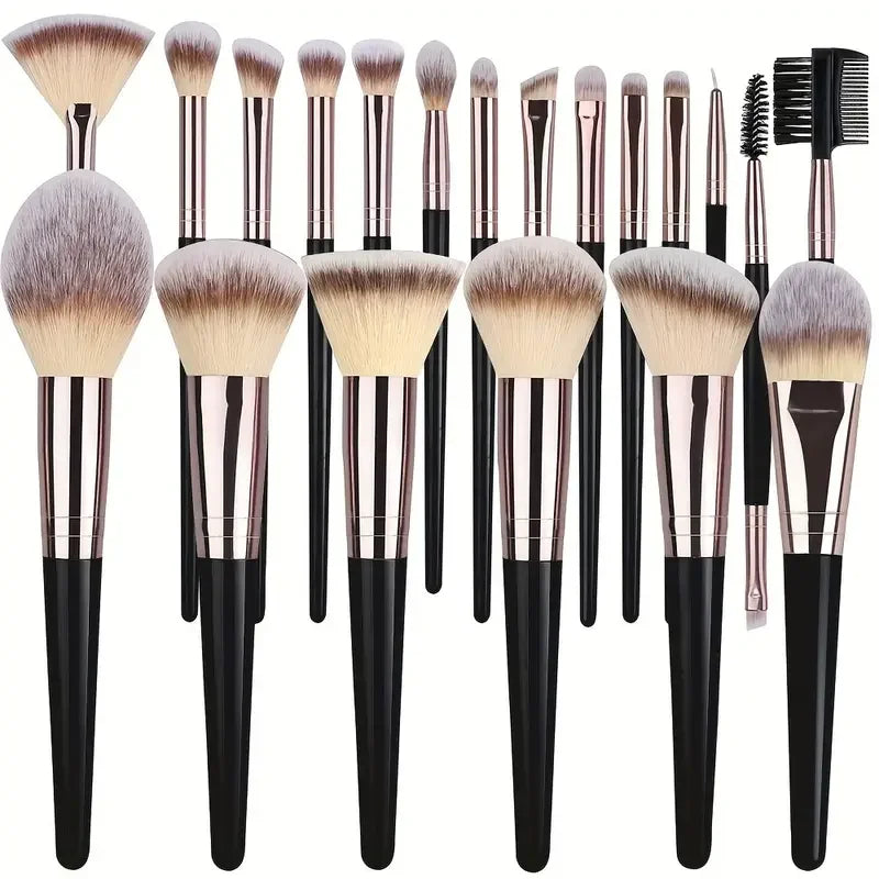 Set of 20 professional makeup brushes including eyeshadow, foundation, blush, and kabuki brushes with soft, fluffy bristles.