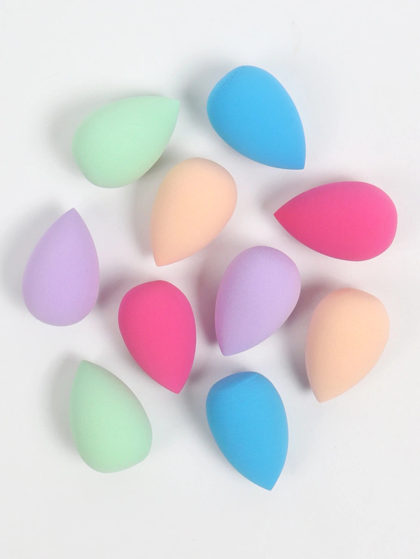 Mini makeup sponge set by amzzonstore with 10 powder puffs and beauty sponges for concealer, foundation, and face makeup application.