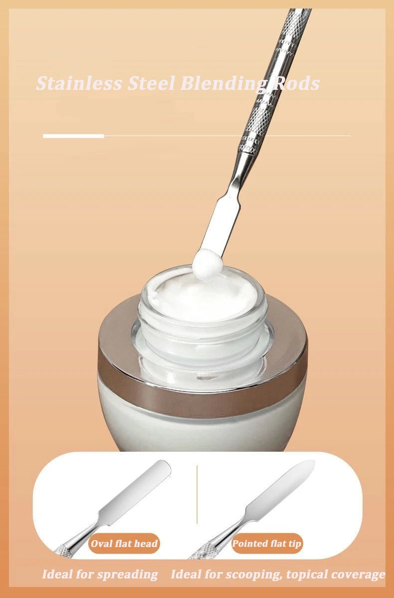Stainless steel makeup mixing palette with spatula and mixing stick for foundation, lipstick, and eye shadow application.