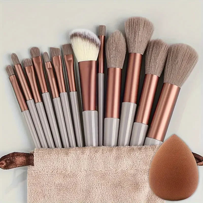 Professional 13-piece makeup brush set with soft, fluffy brushes for foundation, eyeshadow, blush, and powder application.