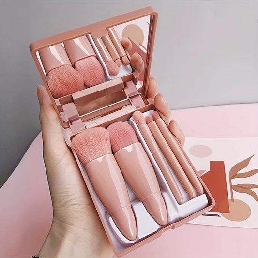 Portable 5-piece mini makeup brush set with mirror, foldable travel cosmetics kit from amzzon.store, includes applicators for easy makeup application.