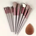 Set of 13 professional makeup brushes from amzzonstore, including foundation, eyeshadow, blush, and powder brushes with soft, fluffy bristles.