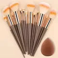 Professional 13-piece makeup brushes set by amzzonstore, includes foundation, eyeshadow, blush, and powder brushes with soft, fluffy bristles.